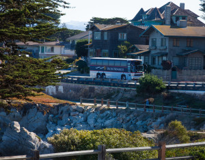 coach at PG row of houses & rock walls